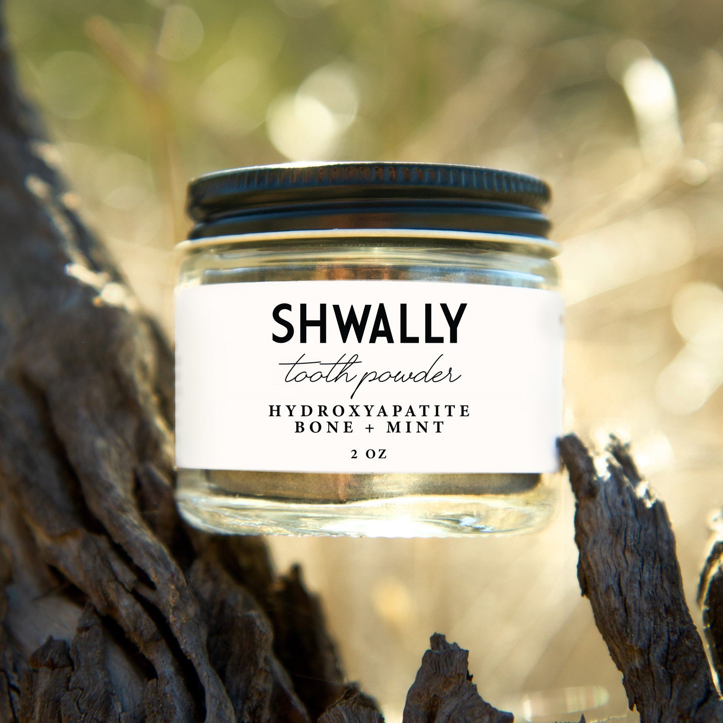 Jar of Shwally Tooth Powder